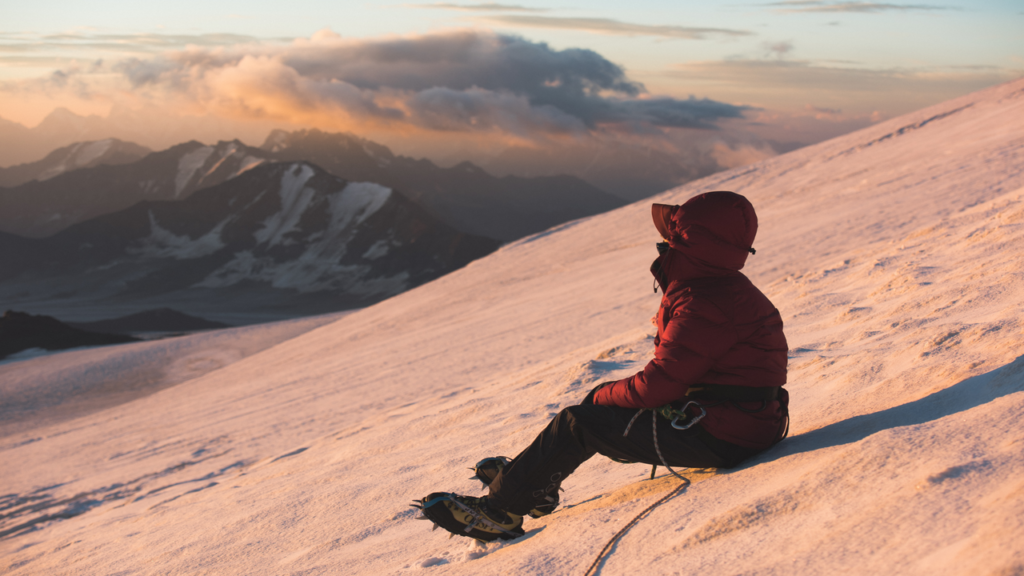 Irina enjoying the sunrise view at Elbrus