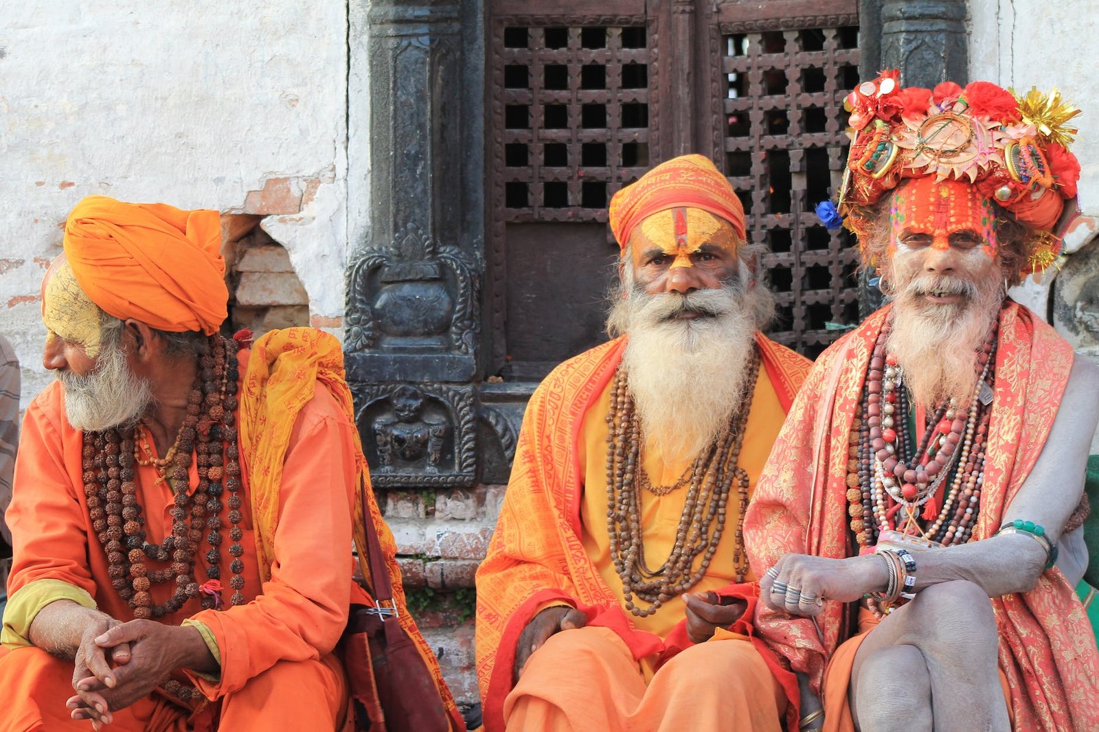 sadhu sitting together at muktinath temple